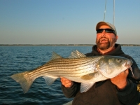 Capt_Dave_with_Fly_Rod_Striper